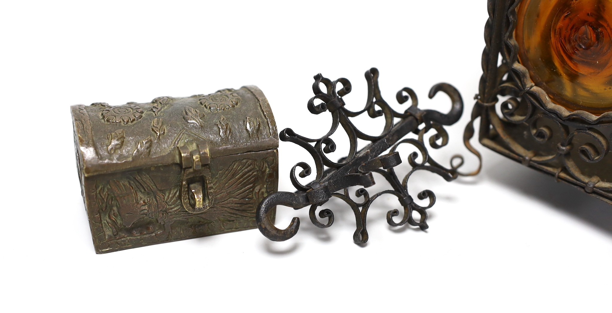 A wrought iron lantern, similar pendant hook, cast miniature brass trunk and bronze effect group, child and dog